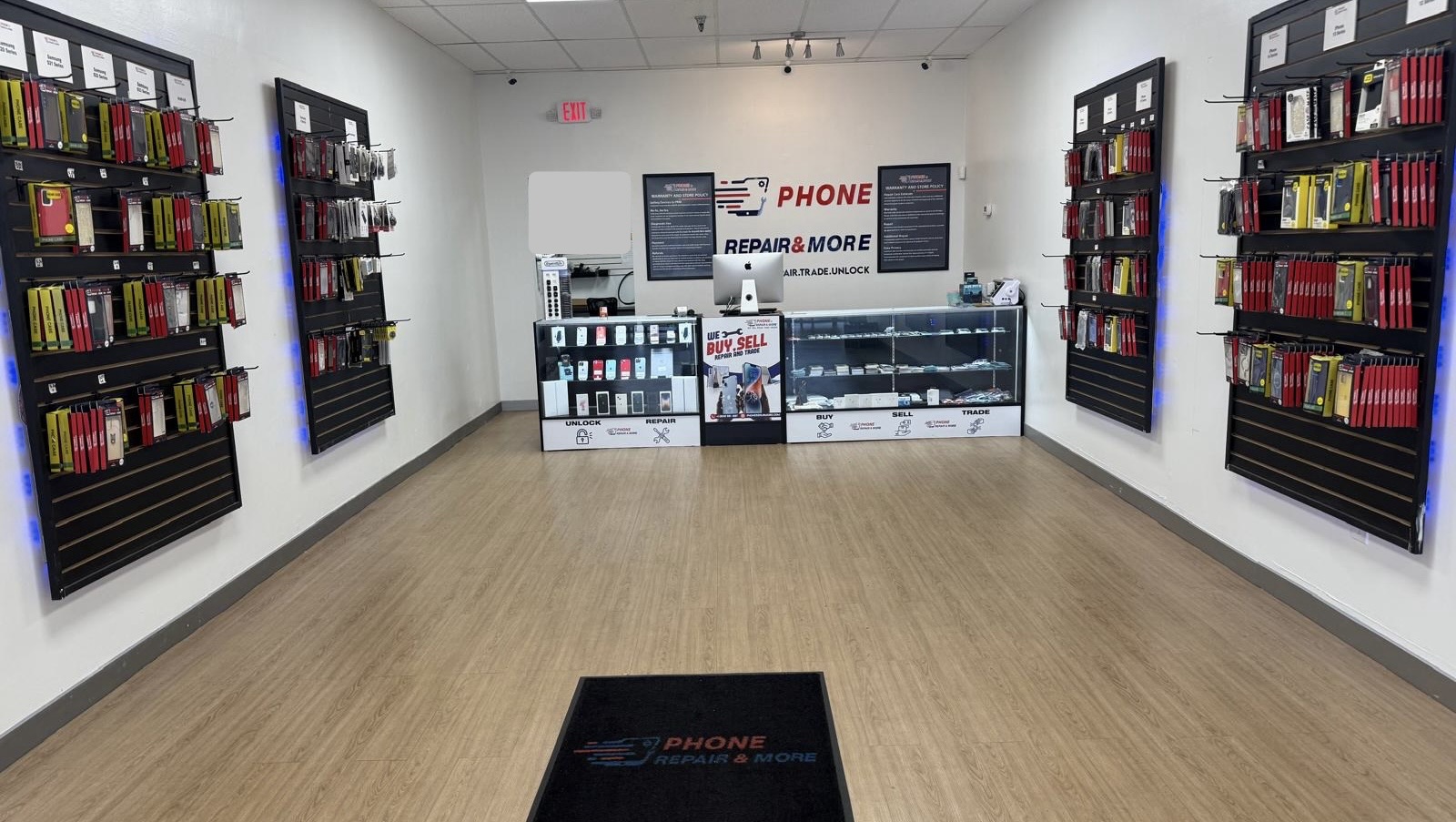Inside the Phone Repair & More store in Alderman Plaza, Palm Harbor, FL