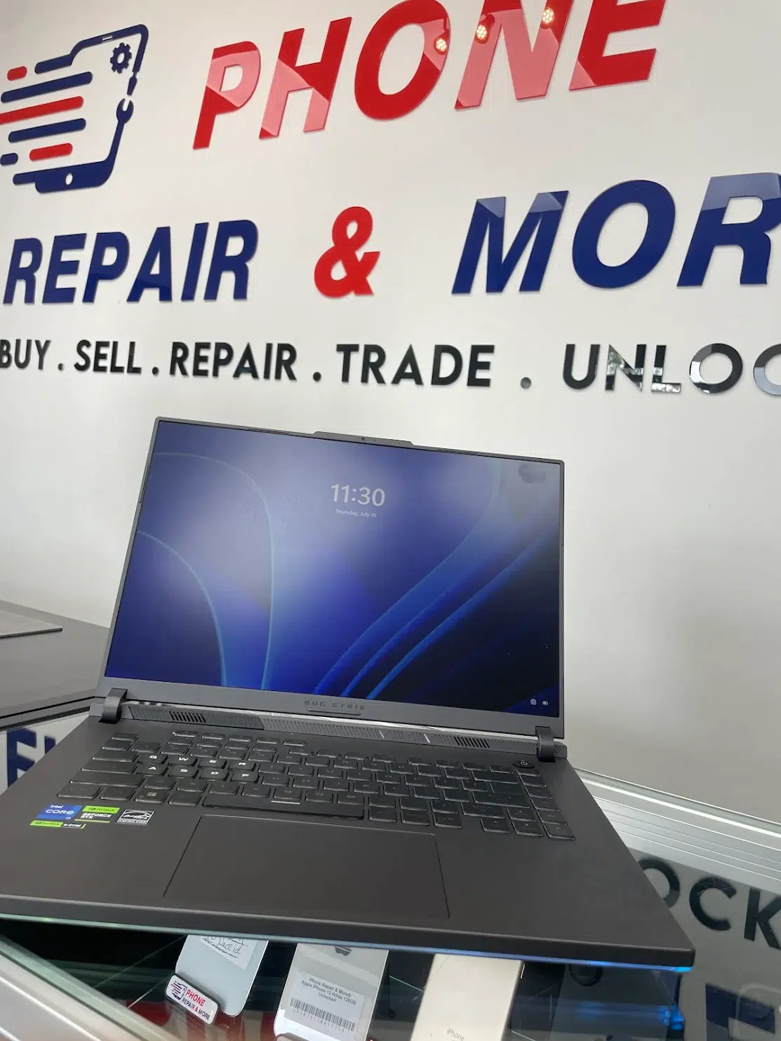 Open ASUS ROG laptop at Phone Repair & More