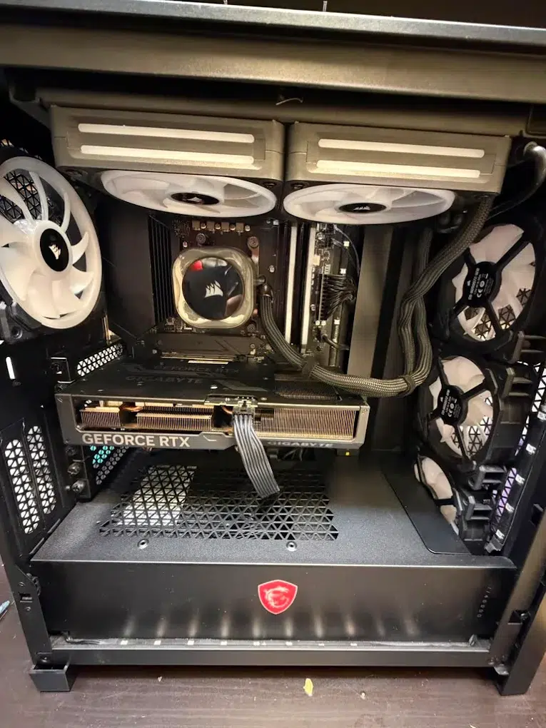 Custom gaming PC with MSI case and GeForce RTX graphics card on the bench at Phone Repair & More Wesley Chapel