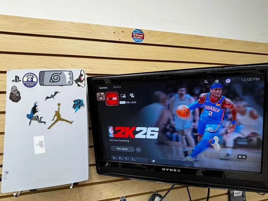 Customised PS5 console and gaming display on the wall at Phone Repair & More Wesley Chapel