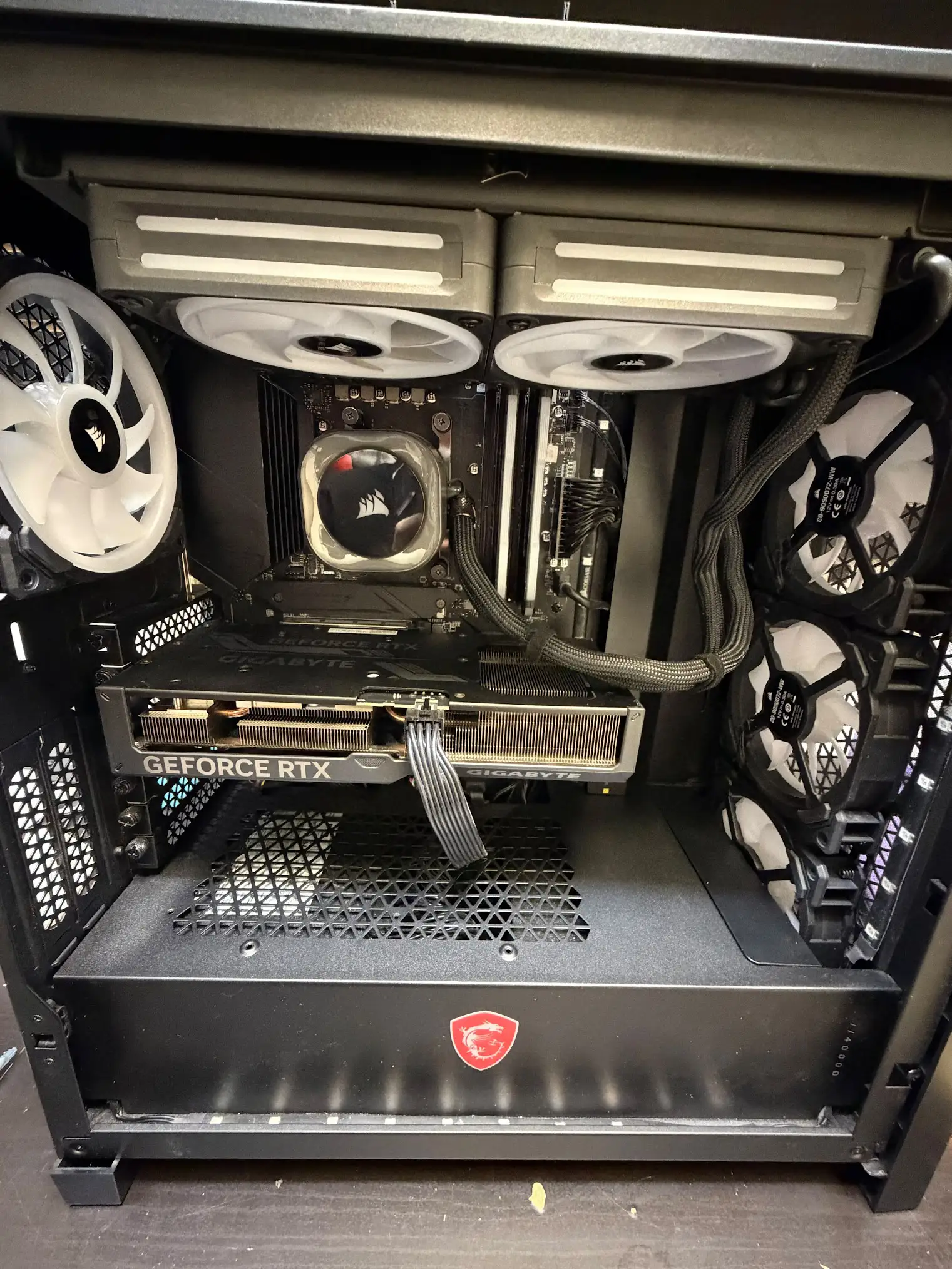 Open Corsair-cooled desktop gaming PC used for desktop troubleshooting