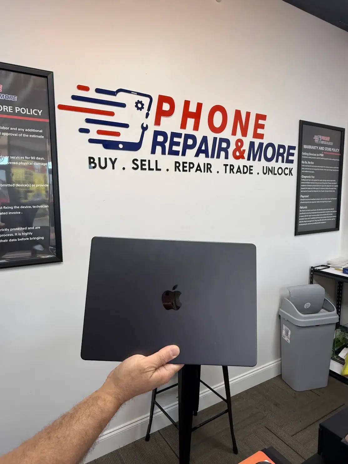 Space gray MacBook Pro at Phone Repair & More