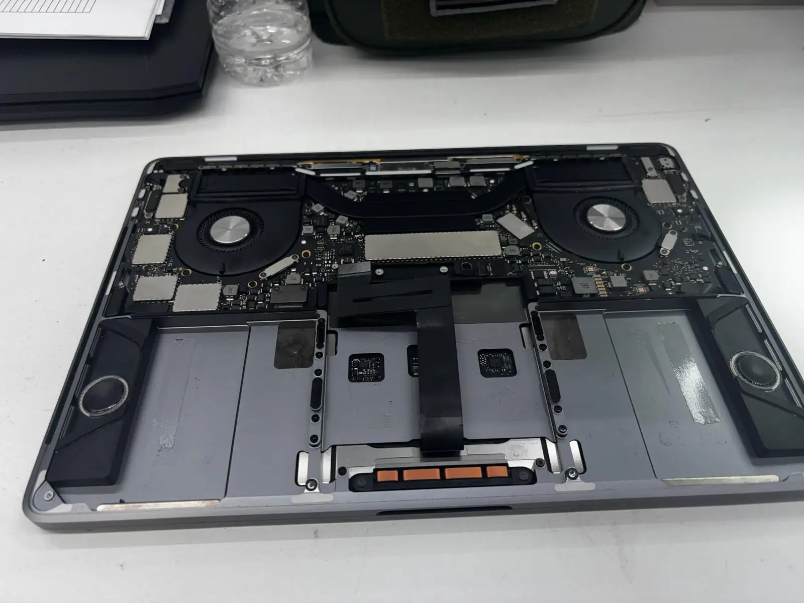 Computer cooling system opened for overheating diagnosis and repair at Phone Repair & More
